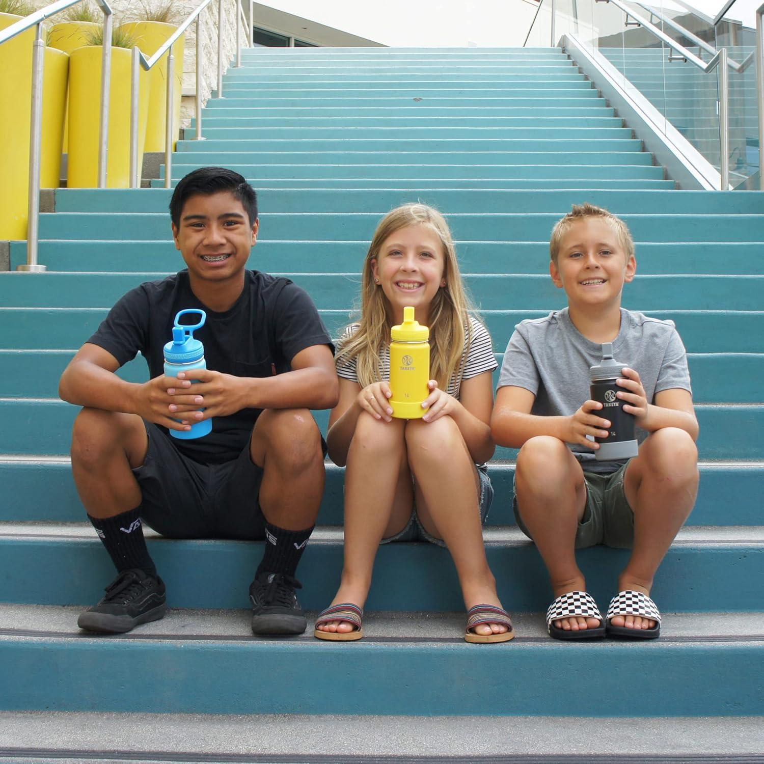 imageTakeya Actives Kids Water Bottle with Straw Lid StainlessSteel Double Wall Insulation BPAFree Bottle Lid with Carry Handle Reusable Bottle with Straw Lid 16 oz PlatinumOnyxSurferLagoon