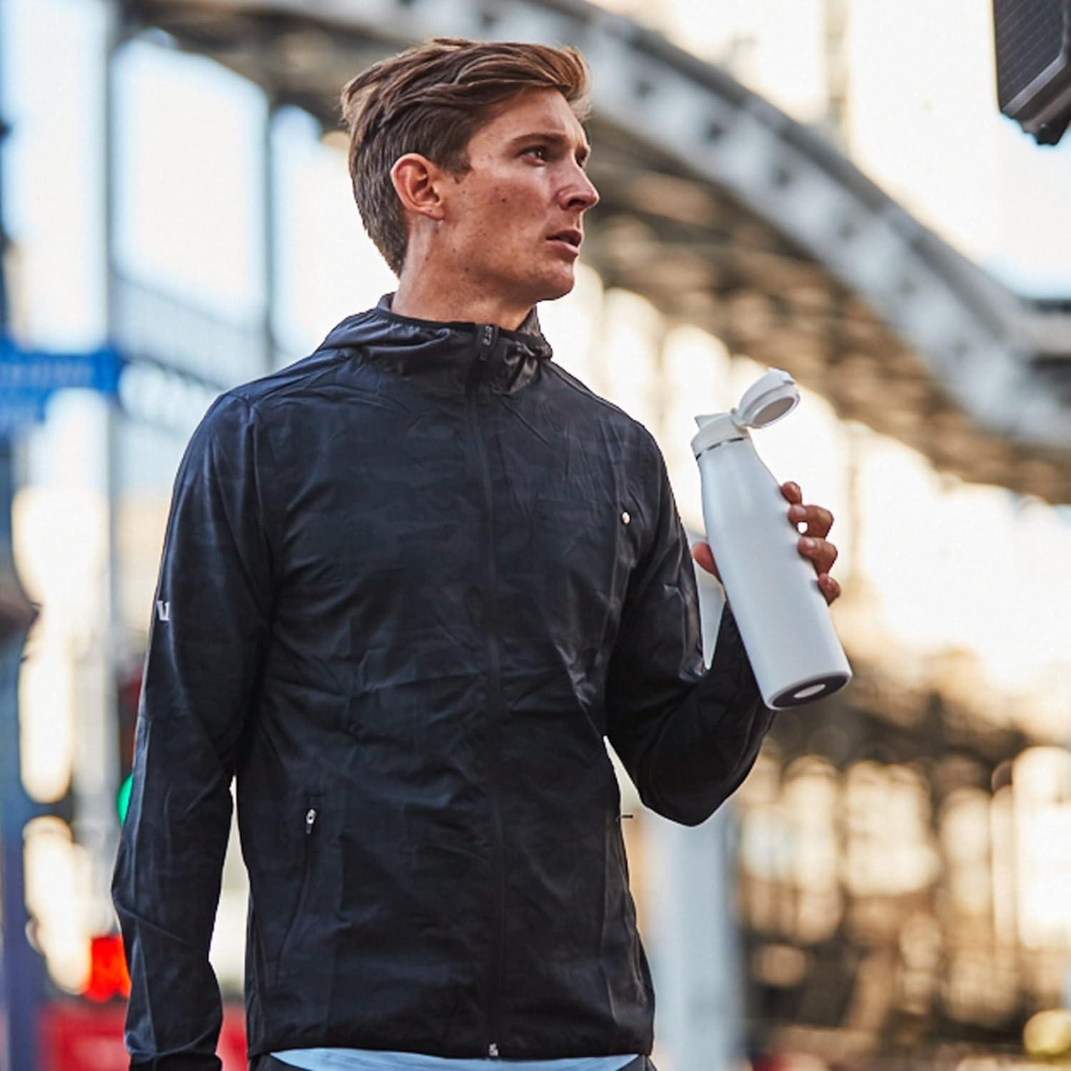 imageTakeya Traveler Leakproof Coffee Mug Carrying Loop Insulated Drinkware for Everyday Use Durable ampamp Portable with SpillProof Design 25 oz AquaArctic