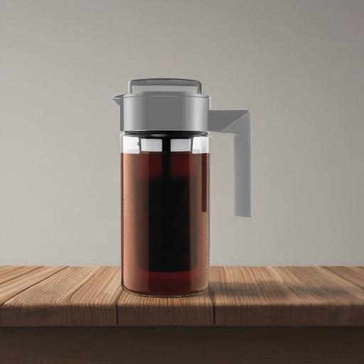 imageTakeya Tritan Cold Brew Coffee Maker Airtight Pitcher with LeakFree Lid BPAFree Cold Brew Maker with Silicone Handle DishwasherSafe Pitcher for Homemade Cold Brew 1 Quart WhiteStone