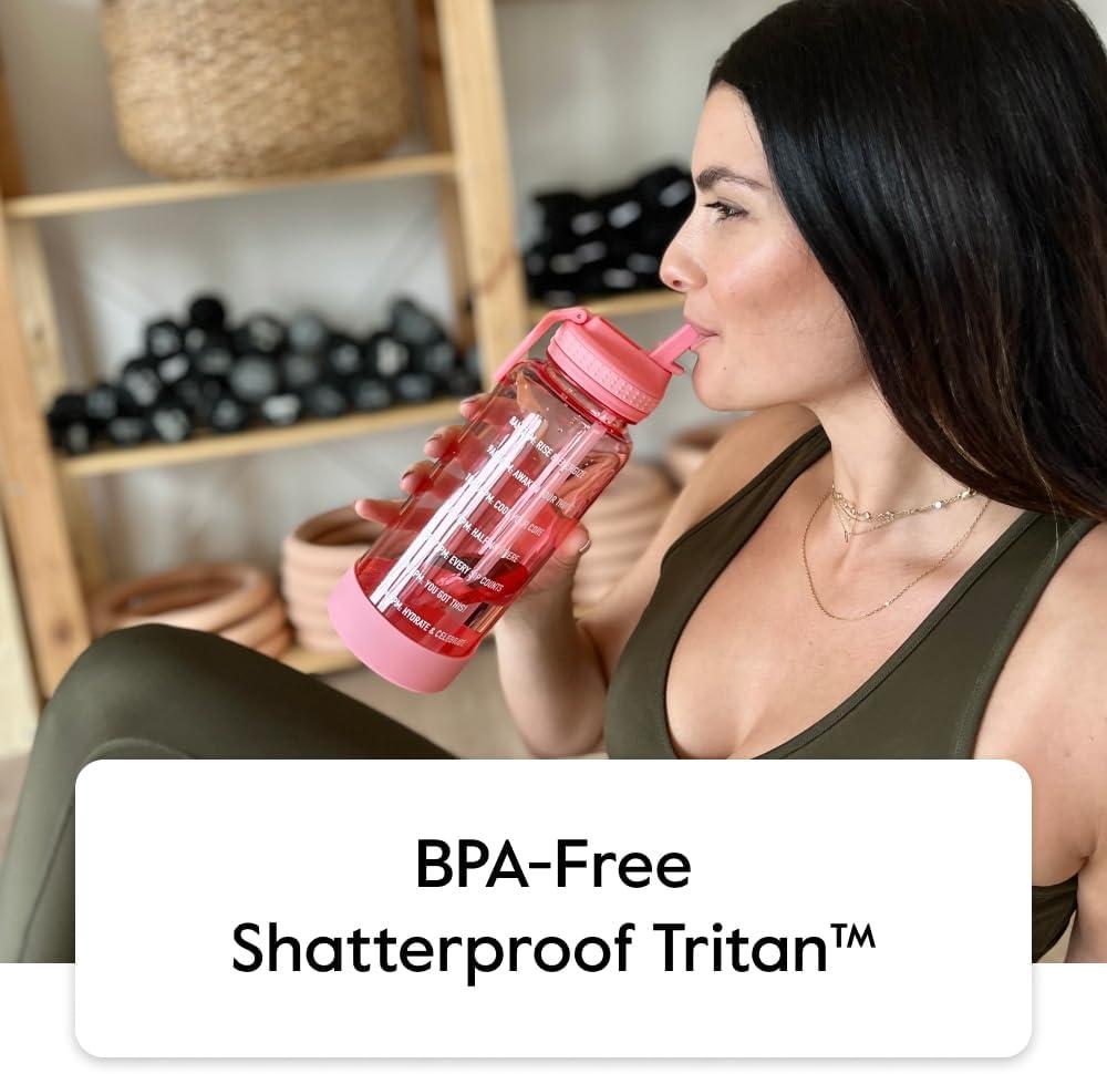 imageTakeya Tritan Motivational Water Bottle with Straw Lid Durable BPAFree With Time Marker Leakproof ampamp NonSlip Bumper 64 oz Vivacity PurpleFlutter Pink