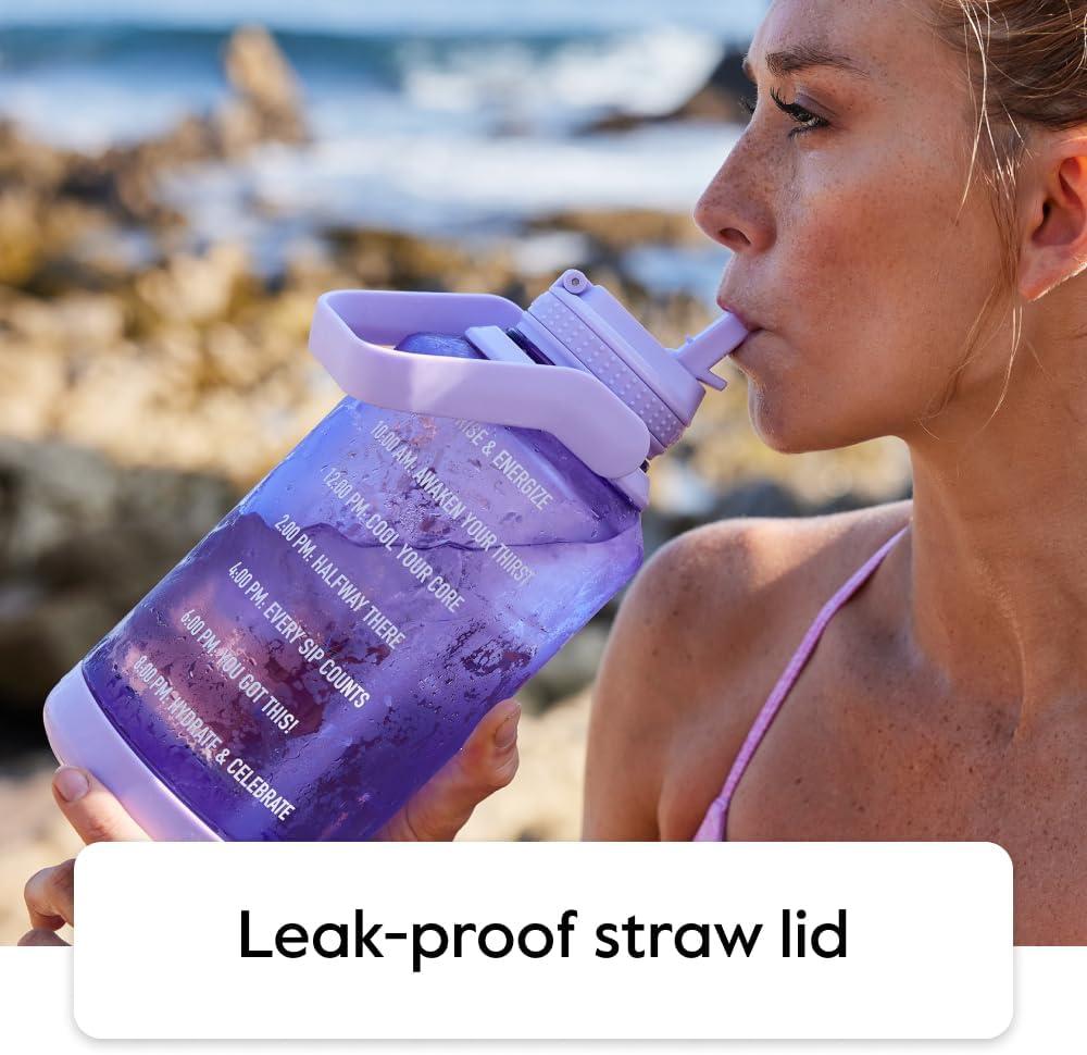 imageTakeya Tritan Motivational Water Bottle with Straw Lid Durable BPAFree With Time Marker Leakproof ampamp NonSlip Bumper 64 oz Vivacity PurpleStormy Black