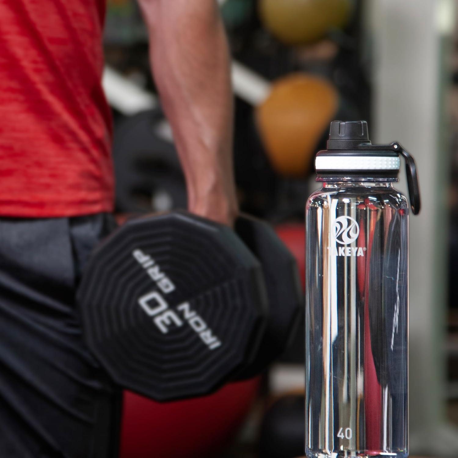 imageTakeya Tritan Sport Water Bottle with Spout Lid BPAFree ampamp DishwasherSafe Water Bottle Reusable Bottle with Lid Handle Simple LeakProof Water Bottle 40 oz Flutter PinkClear