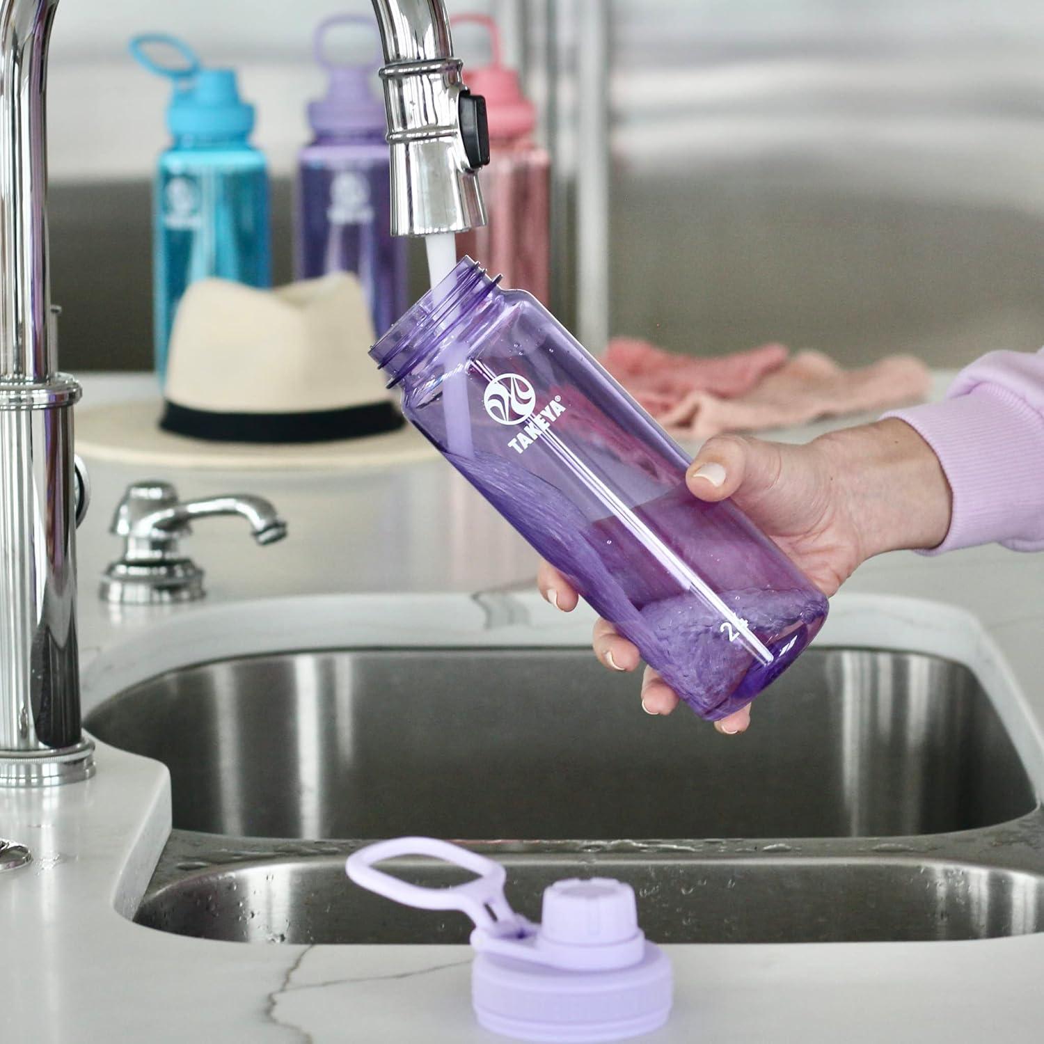 imageTakeya Tritan Sport Water Bottle with Spout Lid BPAFree ampamp DishwasherSafe Water Bottle Reusable Bottle with Lid Handle Simple LeakProof Water Bottle 40 oz Flutter PinkVivacity Purple