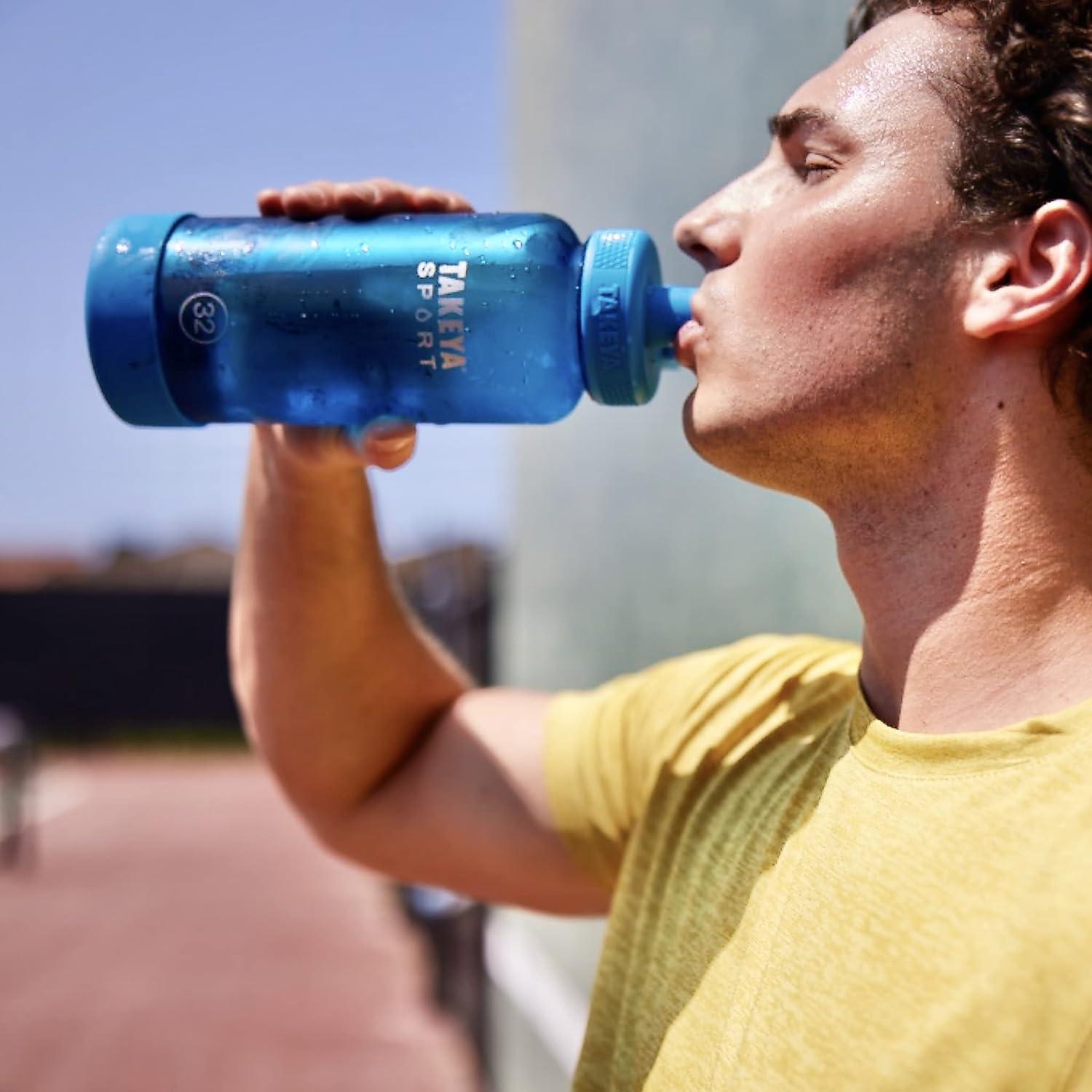 imageTakeya Tritan Sport Water Bottle with Spout Lid BPAFree ampamp DishwasherSafe Water Bottle Reusable Bottle with Lid Handle Simple LeakProof Water Bottle 32 oz Pink SweepGrand Slam Black